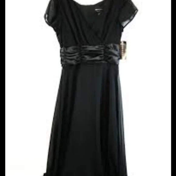 Connected Woman below the knee black dress. V neck short flutter sleeve. - Picture 1 of 3